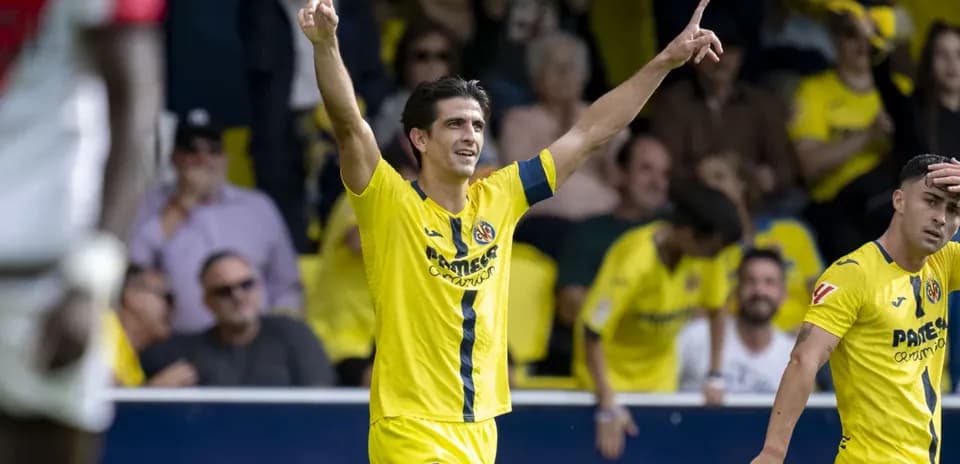 Villarreal player celebrating a goal Villarreal player celebrating a goal