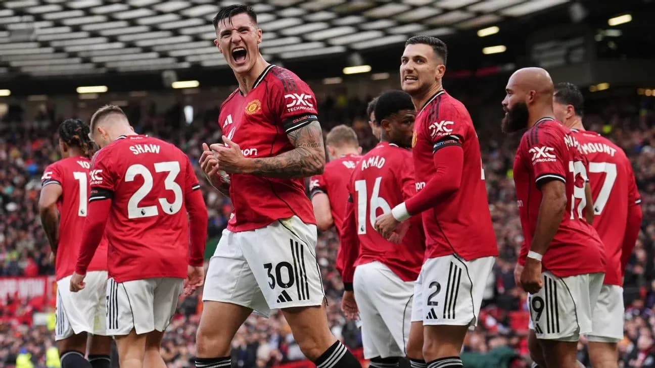 Manchester United players celebrating a goal Manchester United players celebrating a goal