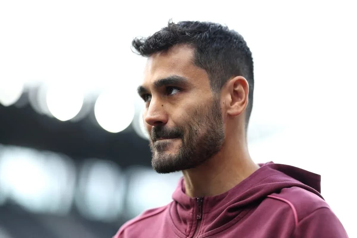 Player in maroon hoodie at stadium Player in maroon hoodie at stadium