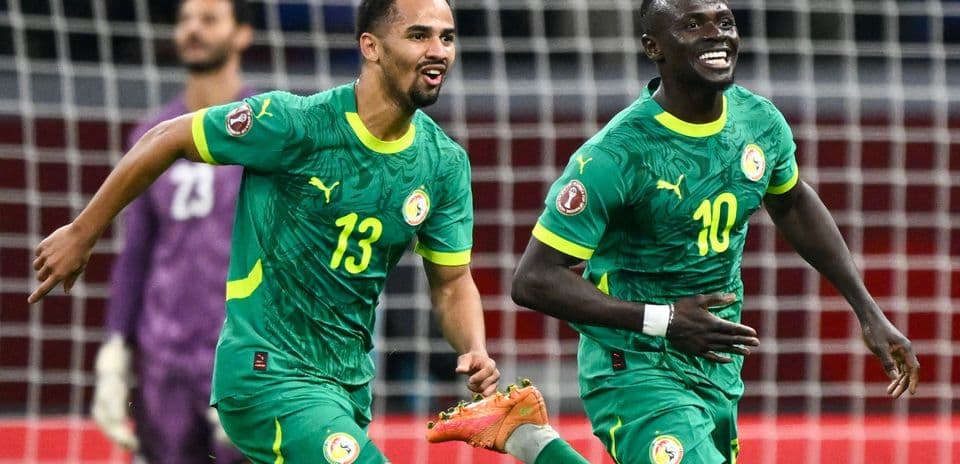 Senegal players celebrating a goal during match Senegal players celebrating a goal during match