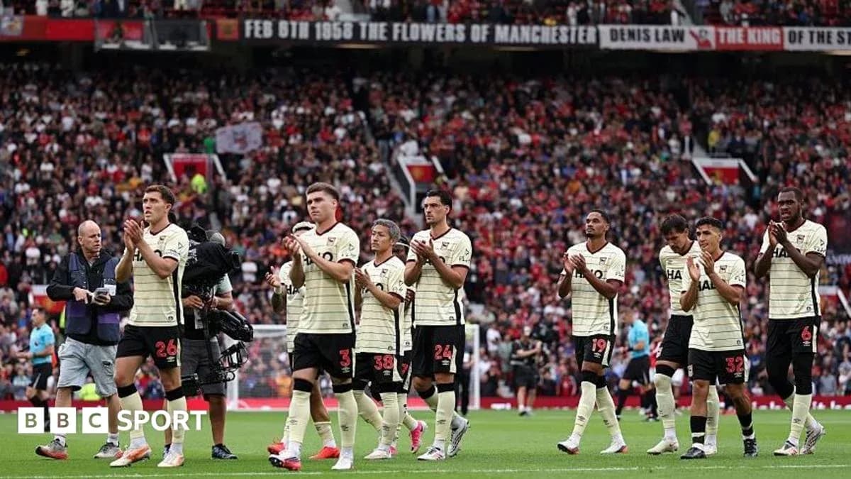 Players applauding fans after match at Old Trafford Players applauding fans after match at Old Trafford