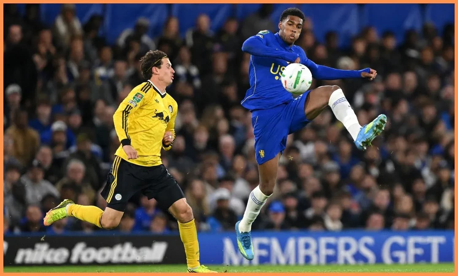 Player kicking the ball during a football match Player kicking the ball during a football match