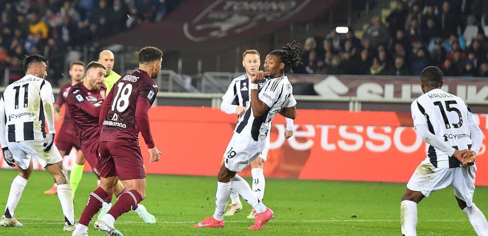 Juventus players in action against Torino Juventus players in action against Torino