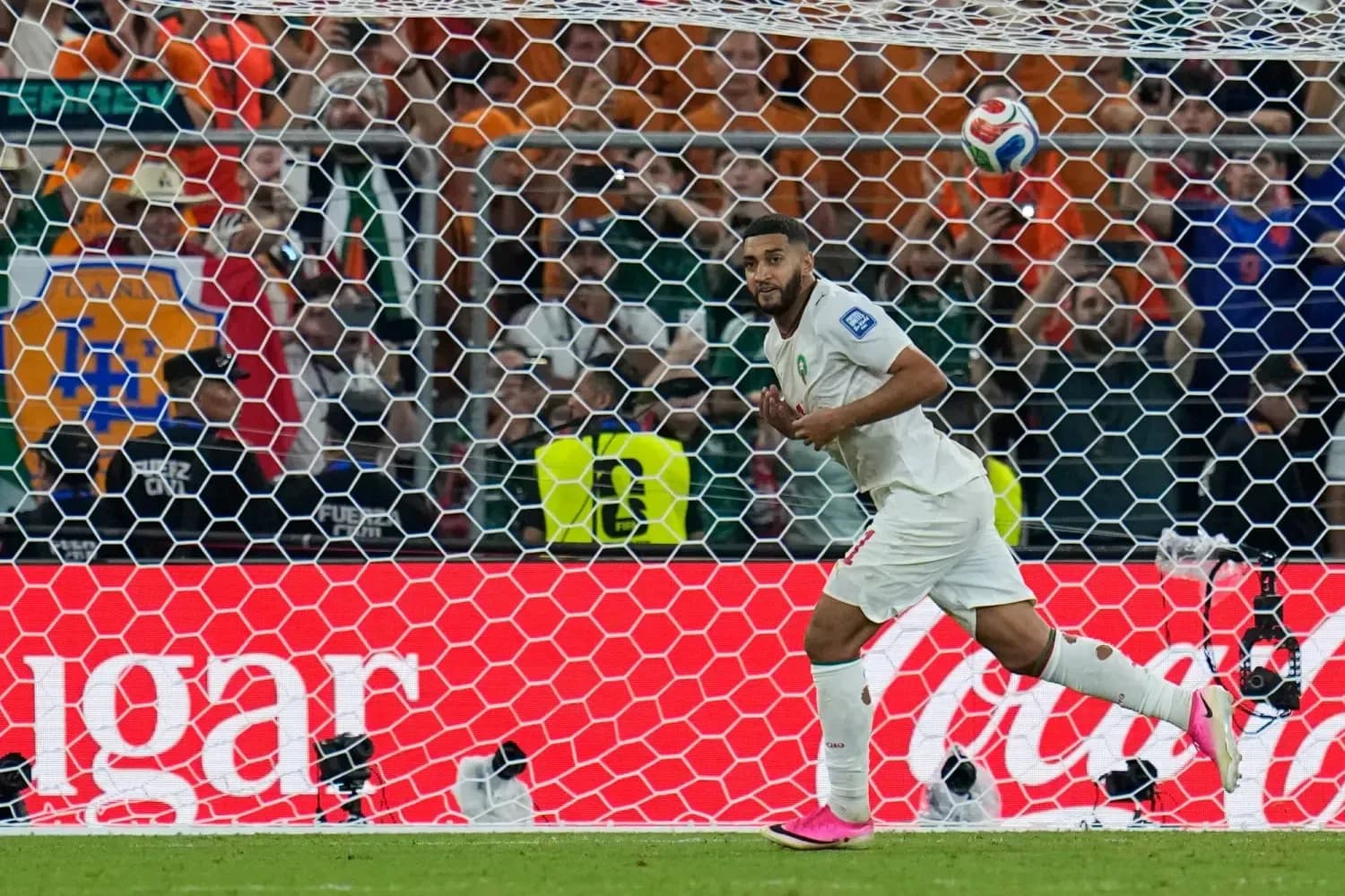 Moroccan player celebrating after scoring a goal Moroccan player celebrating after scoring a goal