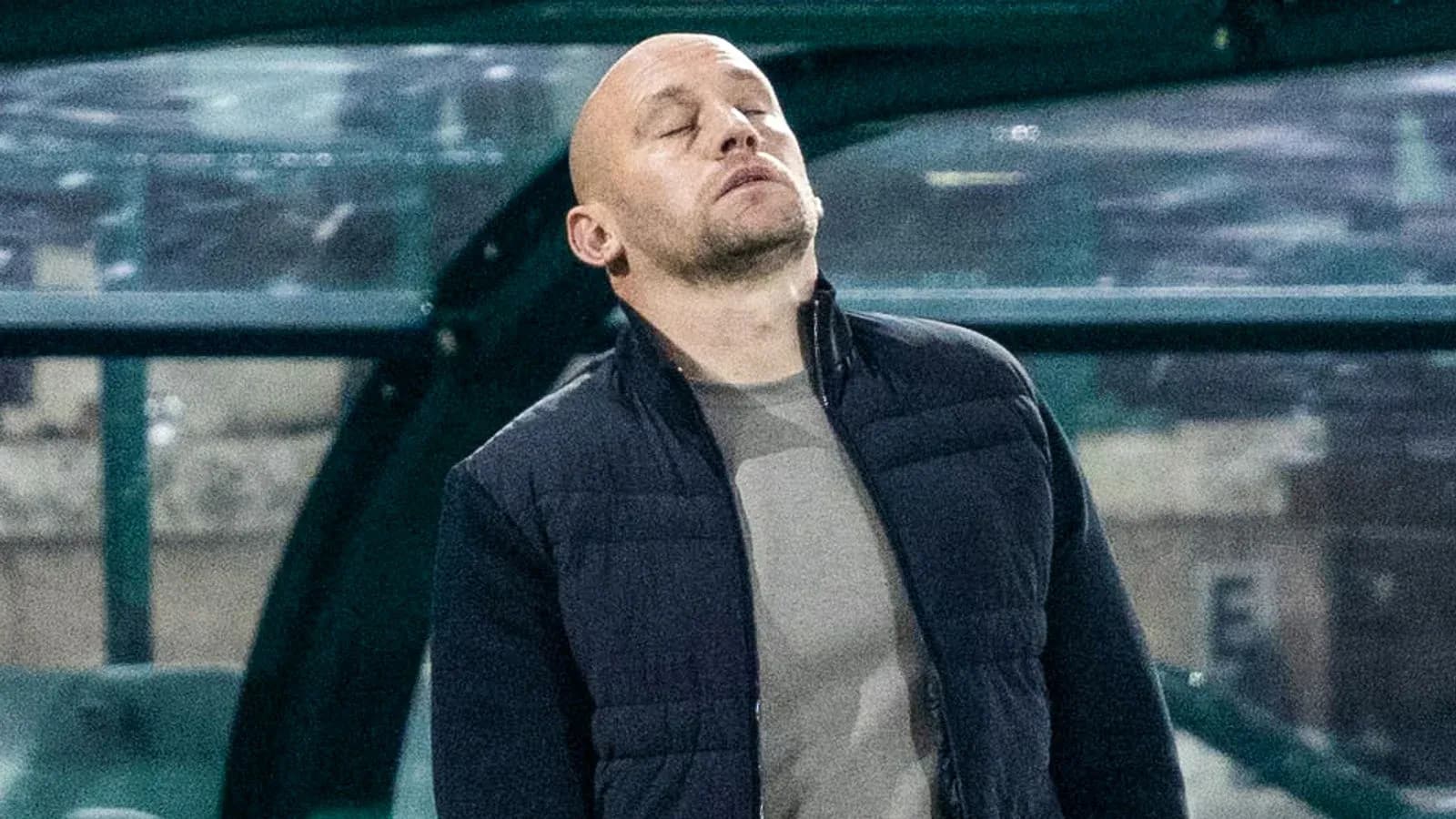 Coach looking frustrated on the sidelines Coach looking frustrated on the sidelines