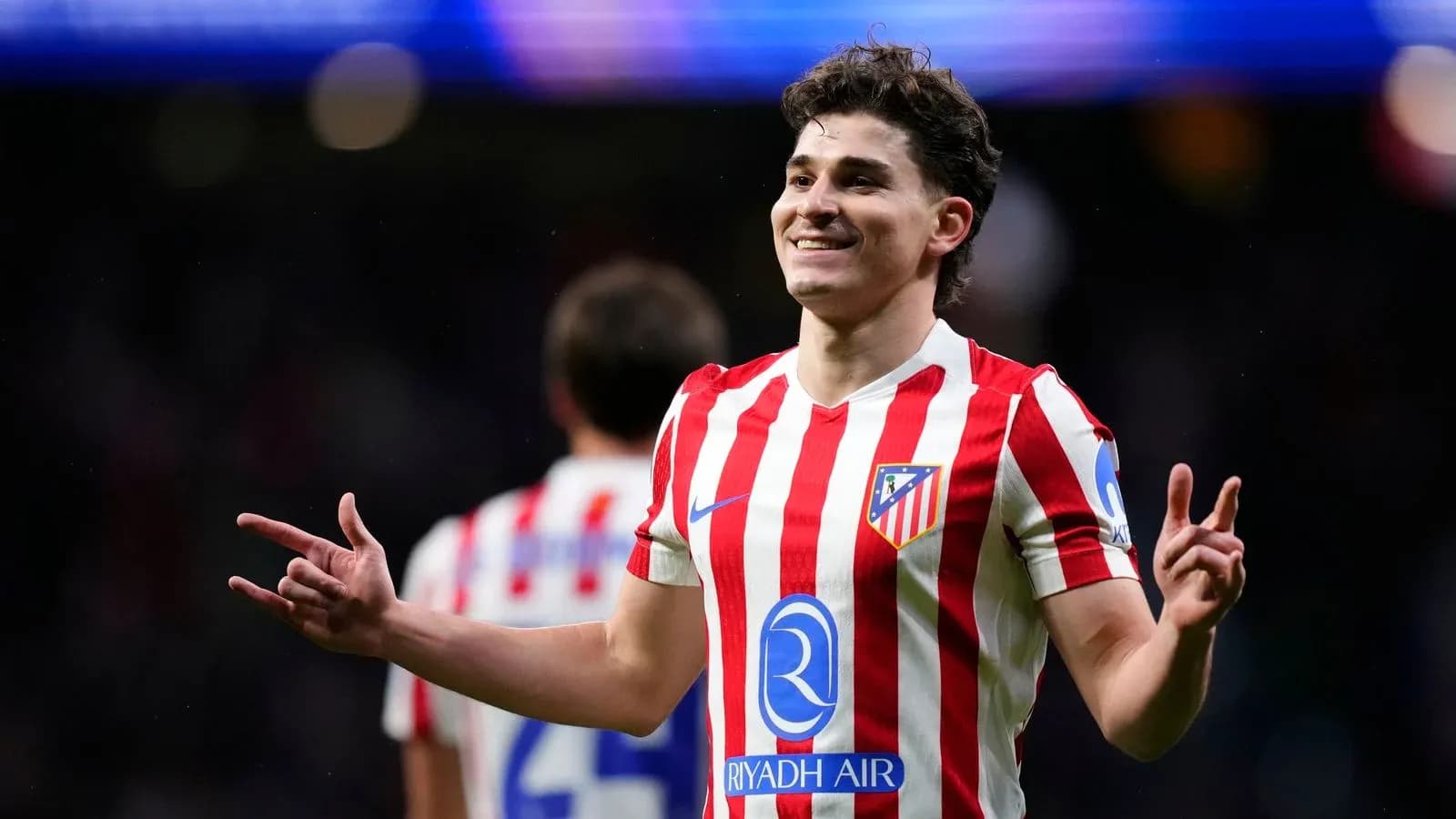 Atletico Madrid player celebrating during match Atletico Madrid player celebrating during match