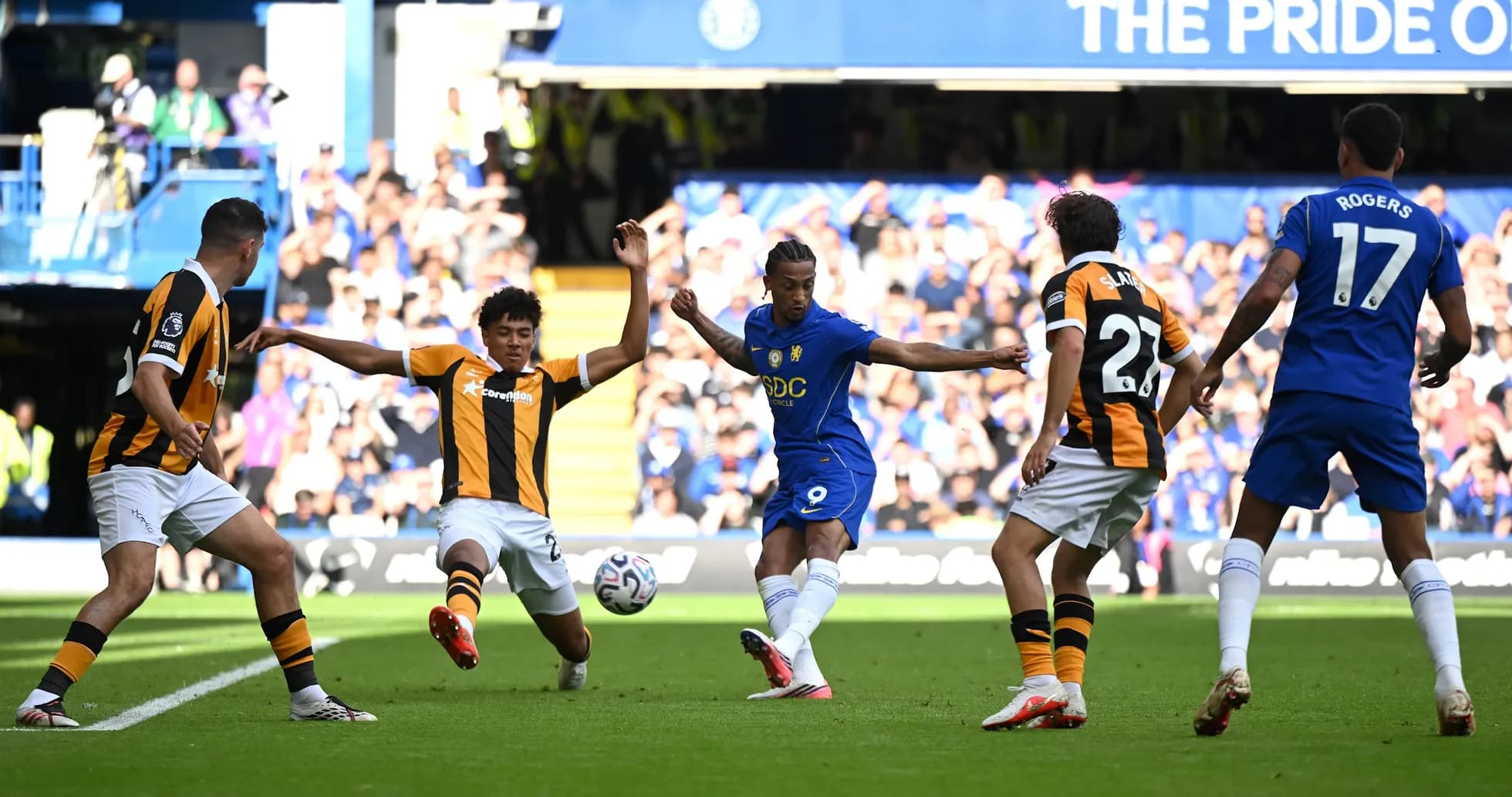 Chelsea player attempting to shoot against Hull City Chelsea player attempting to shoot against Hull City