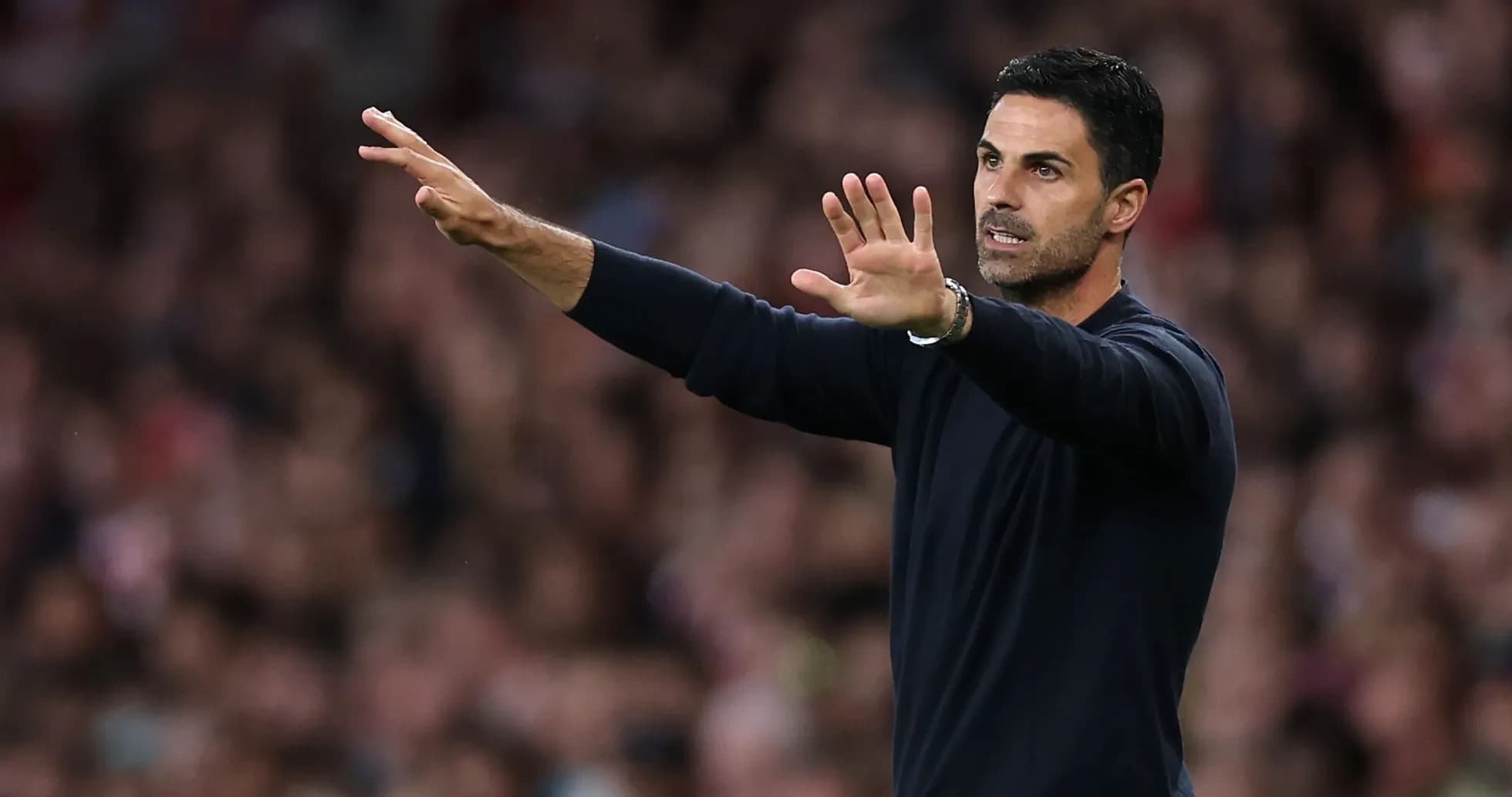 Manager gesturing during a football match Manager gesturing during a football match