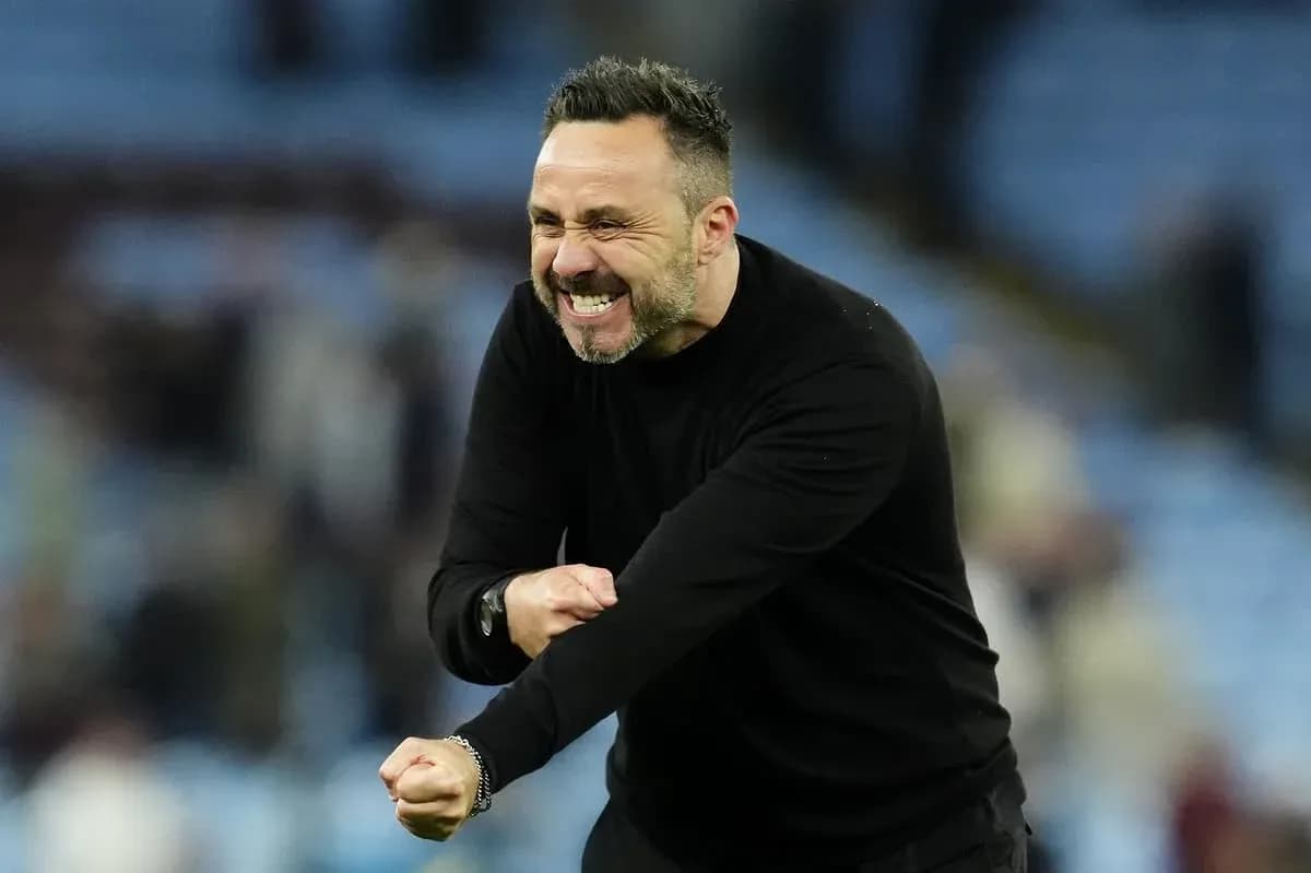 Coach celebrating enthusiastically during a match Coach celebrating enthusiastically during a match