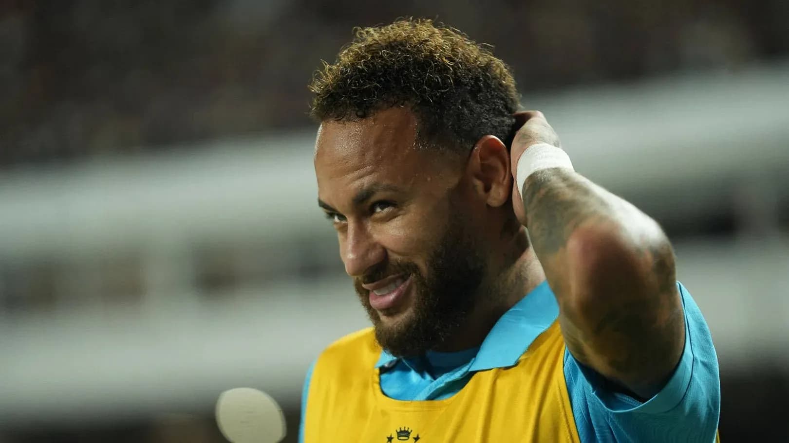 Neymar adjusting his hair on the sidelines Neymar adjusting his hair on the sidelines