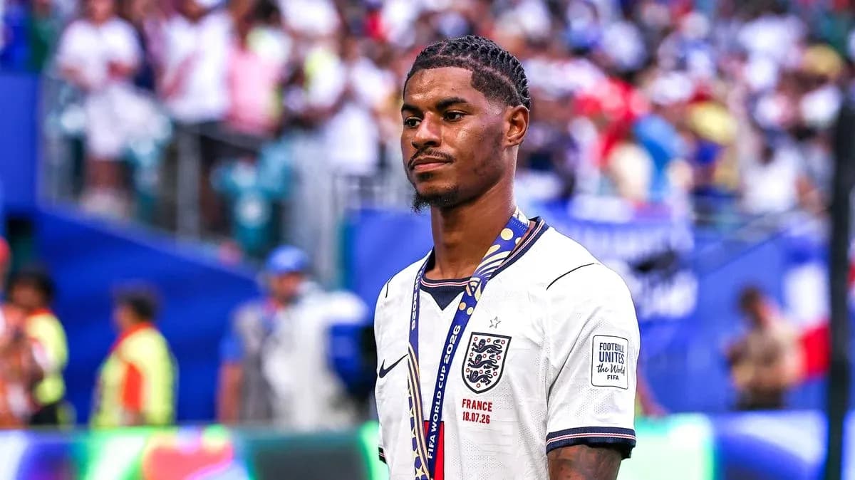 Player in England jersey wearing a medal after match Player in England jersey wearing a medal after match