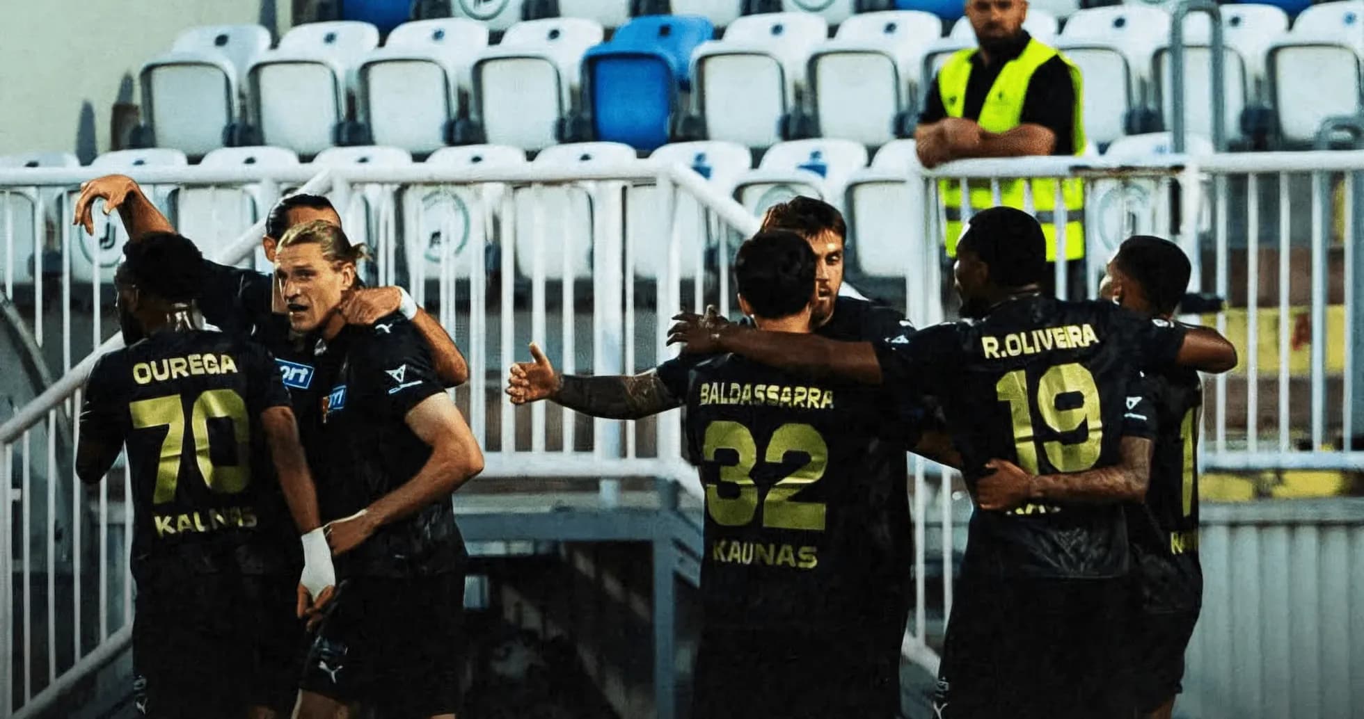 Players celebrating a goal during UEFA match Players celebrating a goal during UEFA match