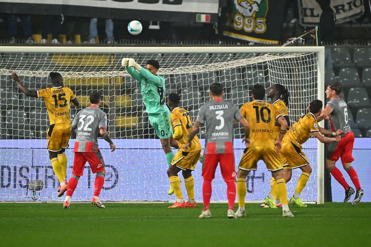 Goalkeeper making a save during Udinese match Goalkeeper making a save during Udinese match