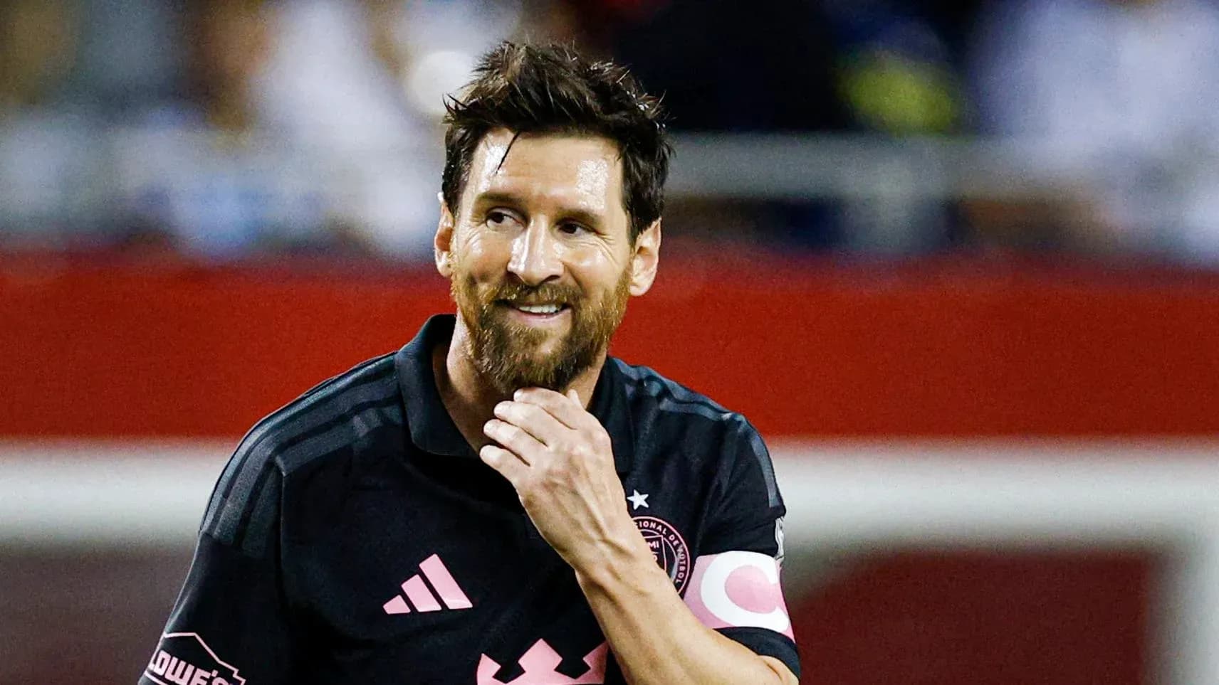 Player wearing black jersey during match celebration Player wearing black jersey during match celebration
