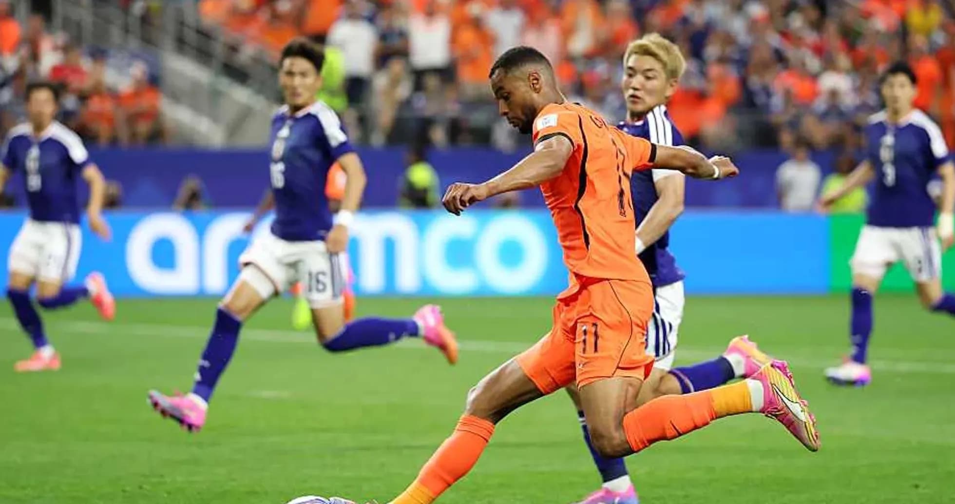 Player kicking ball during Netherlands vs Japan match Player kicking ball during Netherlands vs Japan match