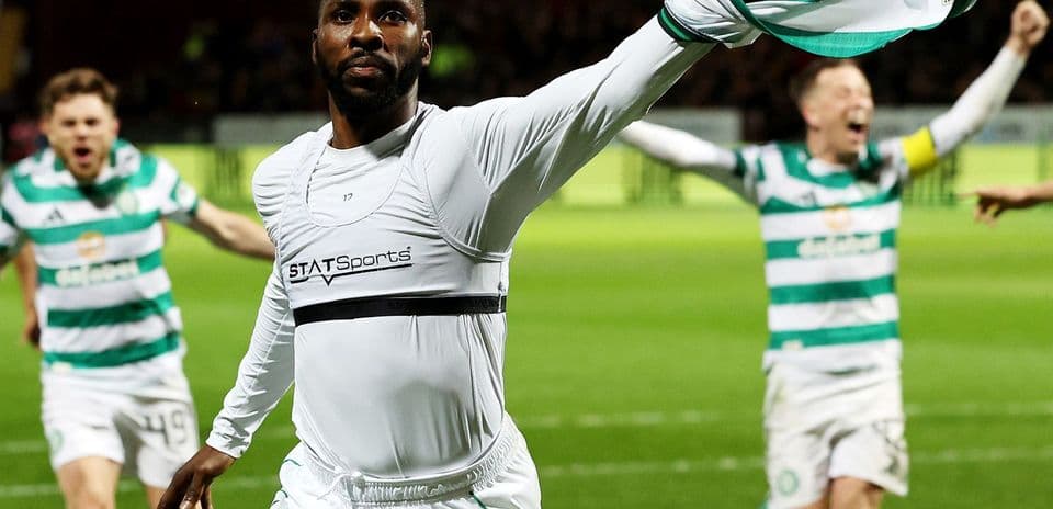 Player celebrating with teammates after scoring goal Player celebrating with teammates after scoring goal