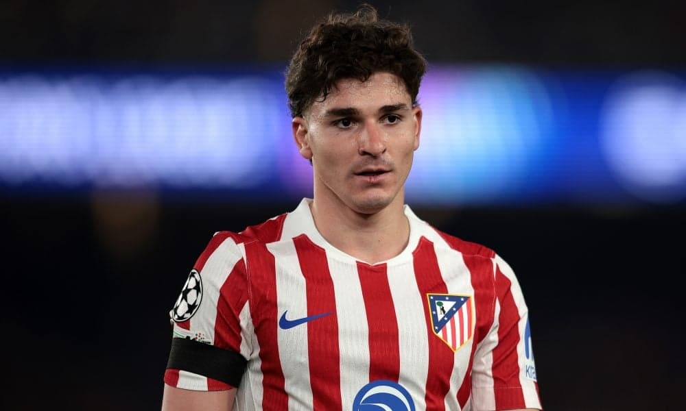 Atletico Madrid player in red and white jersey Atletico Madrid player in red and white jersey