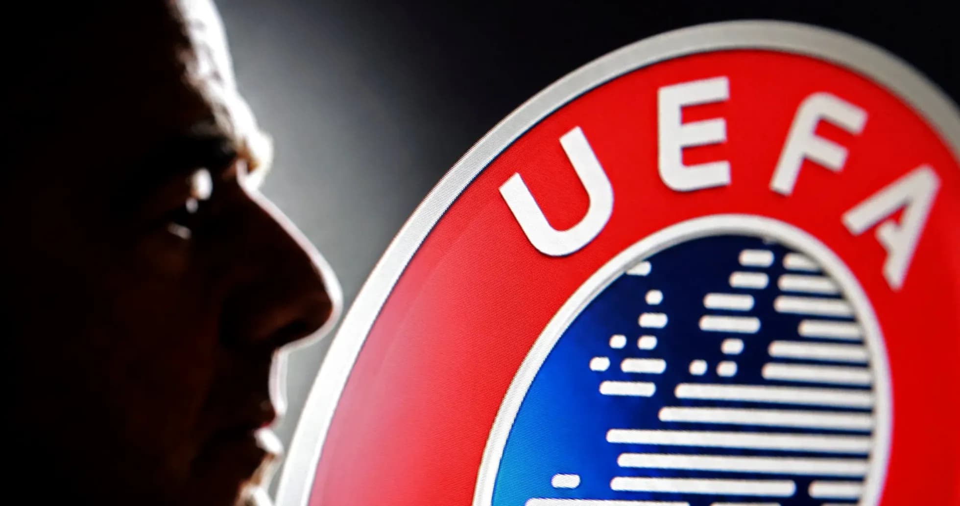 Profile of a person next to UEFA logo Profile of a person next to UEFA logo