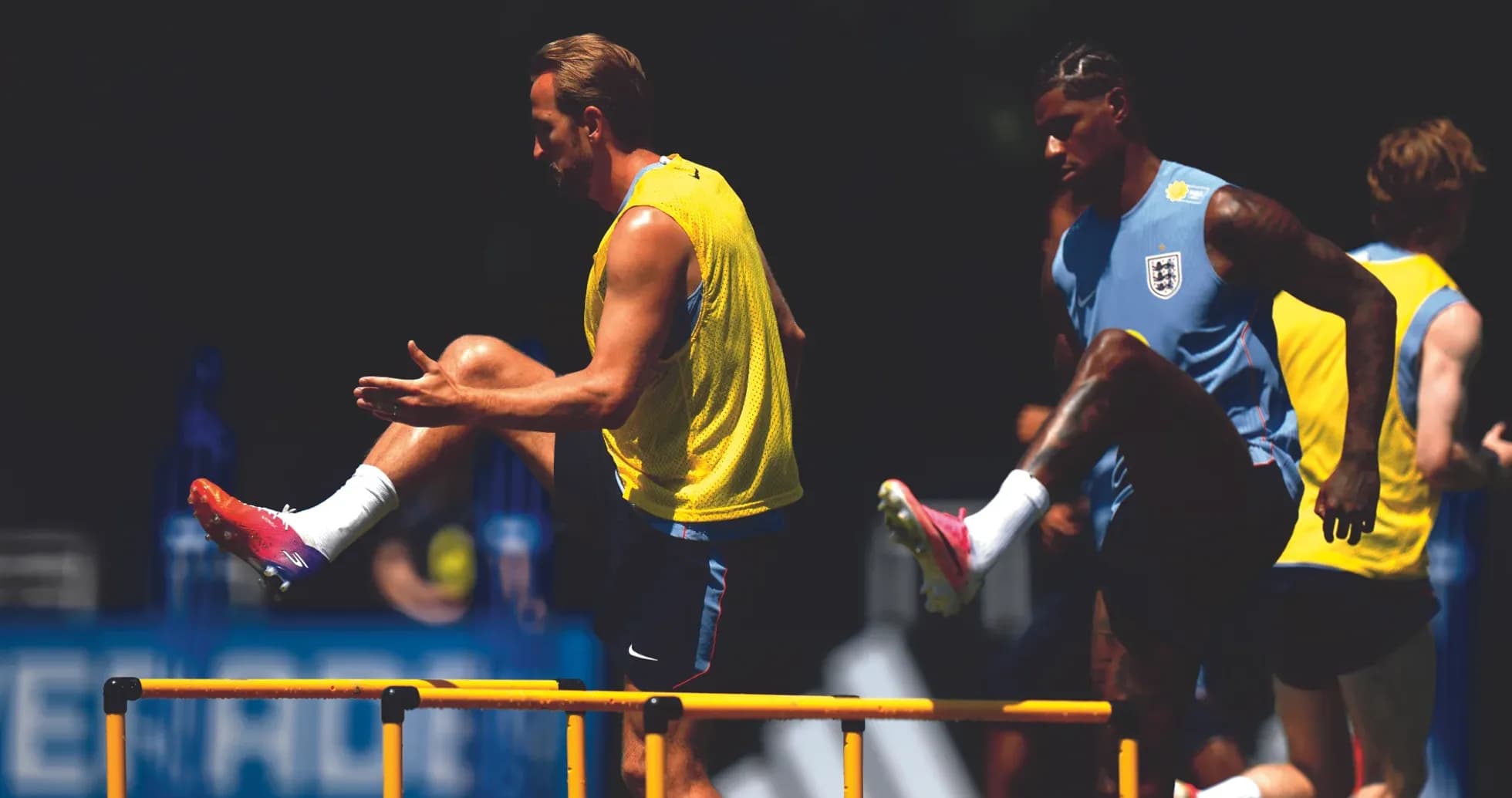 Players training with hurdles during a practice session Players training with hurdles during a practice session