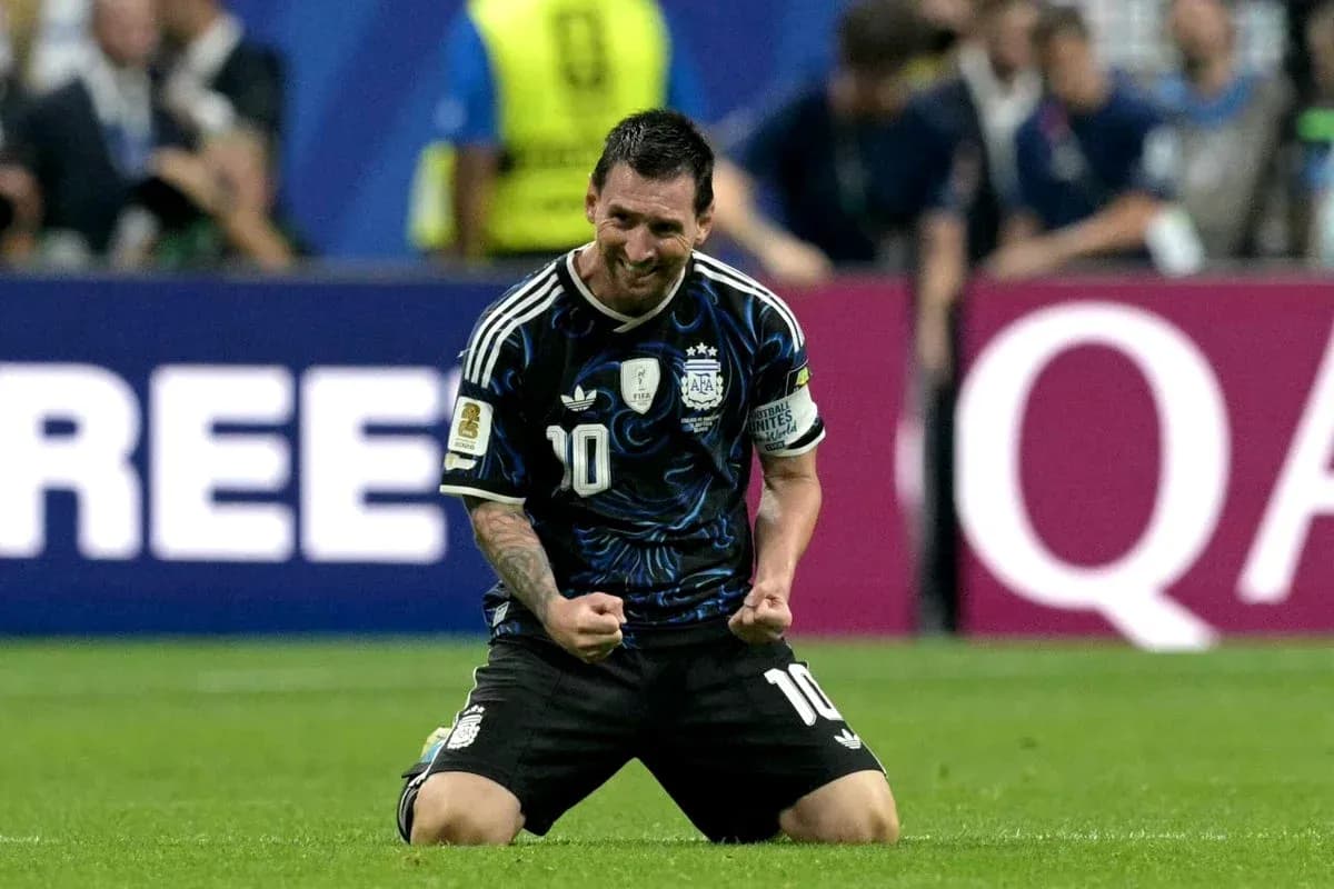 Player celebrating on the field after scoring Player celebrating on the field after scoring