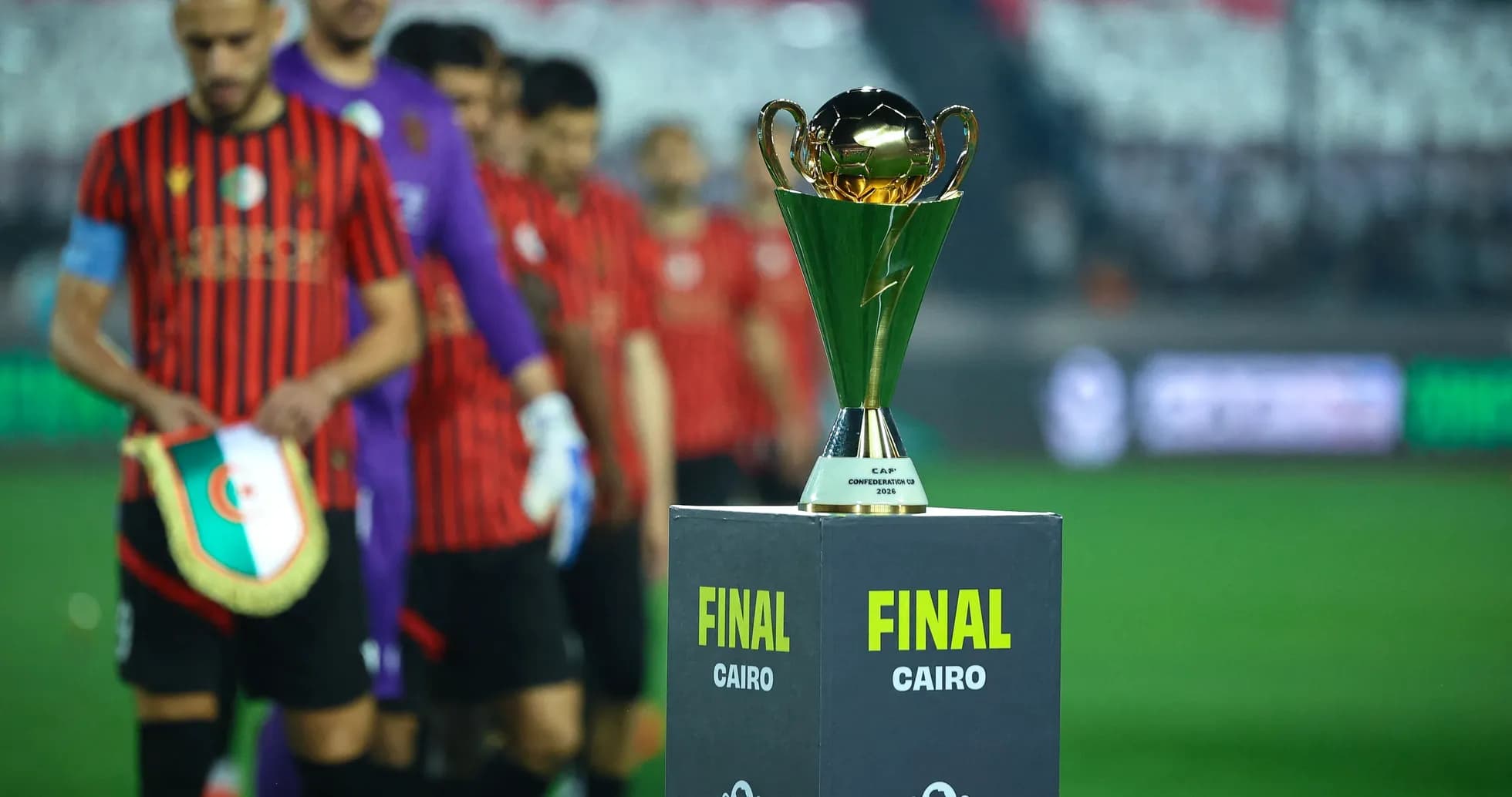 Teams entering the field with trophy before final Teams entering the field with trophy before final