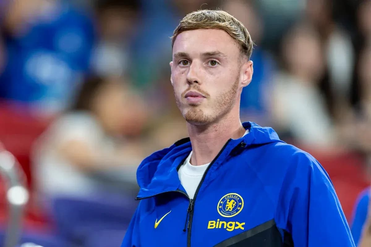 Player in Chelsea training gear on sidelines Player in Chelsea training gear on sidelines