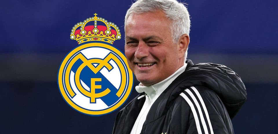 Jose Mourinho smiling with Real Madrid logo background Jose Mourinho smiling with Real Madrid logo background