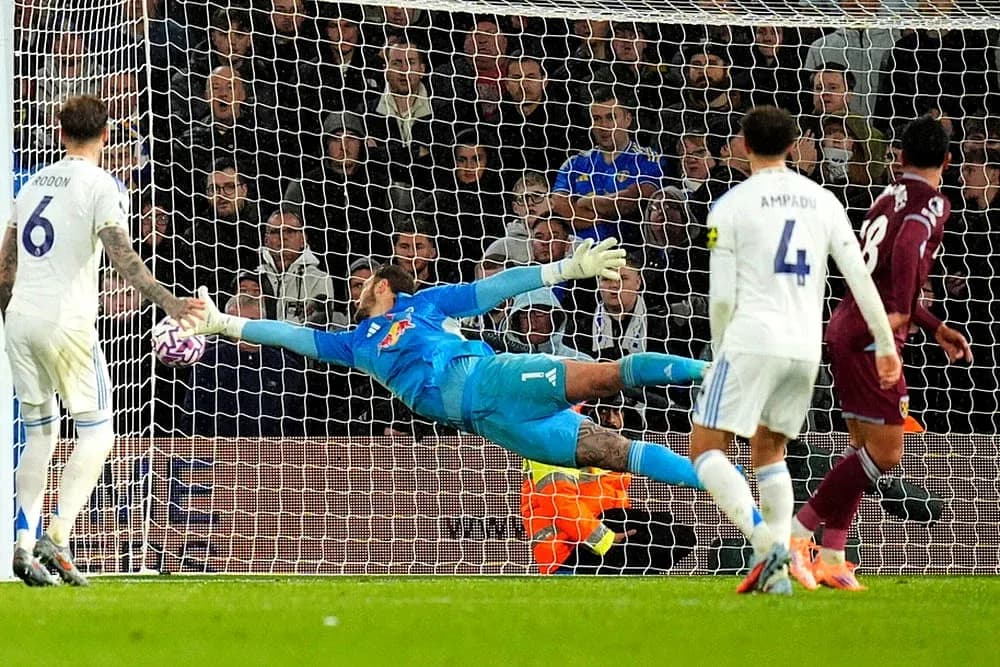 Goalkeeper making a save during match Goalkeeper making a save during match