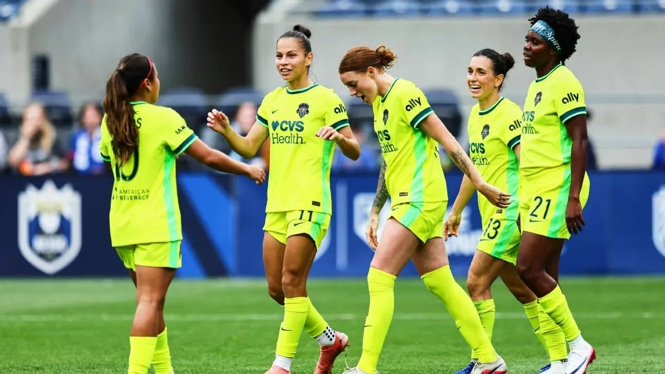 Players celebrating during NWSL match Players celebrating during NWSL match
