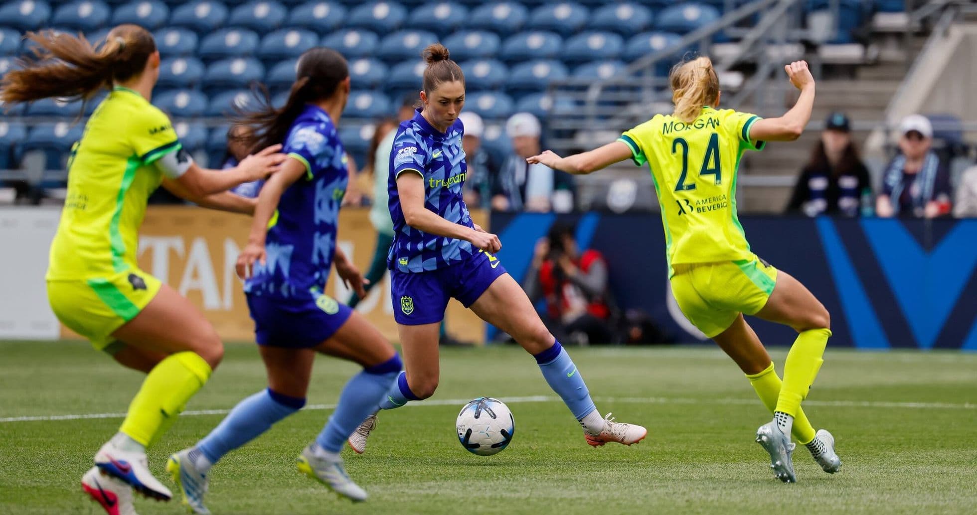 Seattle Reign FC player dribbling against Gotham FC Seattle Reign FC player dribbling against Gotham FC