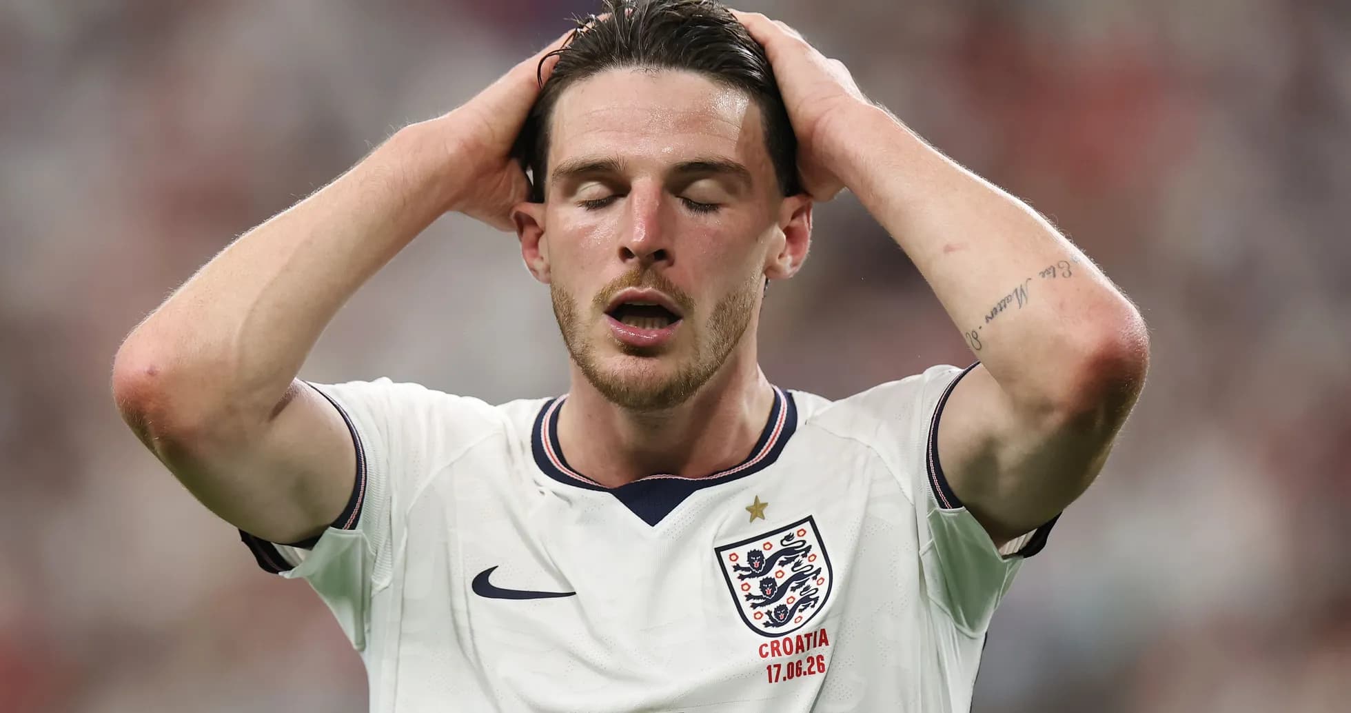 Player holding head in disappointment during match Player holding head in disappointment during match