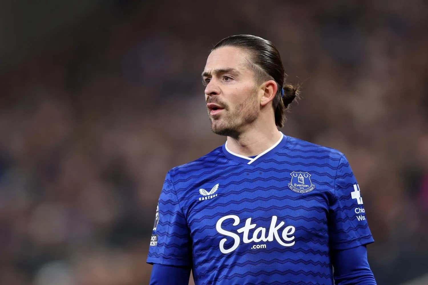 Player in blue Everton jersey during match Player in blue Everton jersey during match
