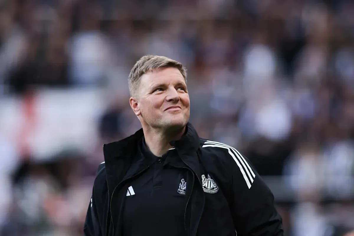 Newcastle United manager smiling during match Newcastle United manager smiling during match