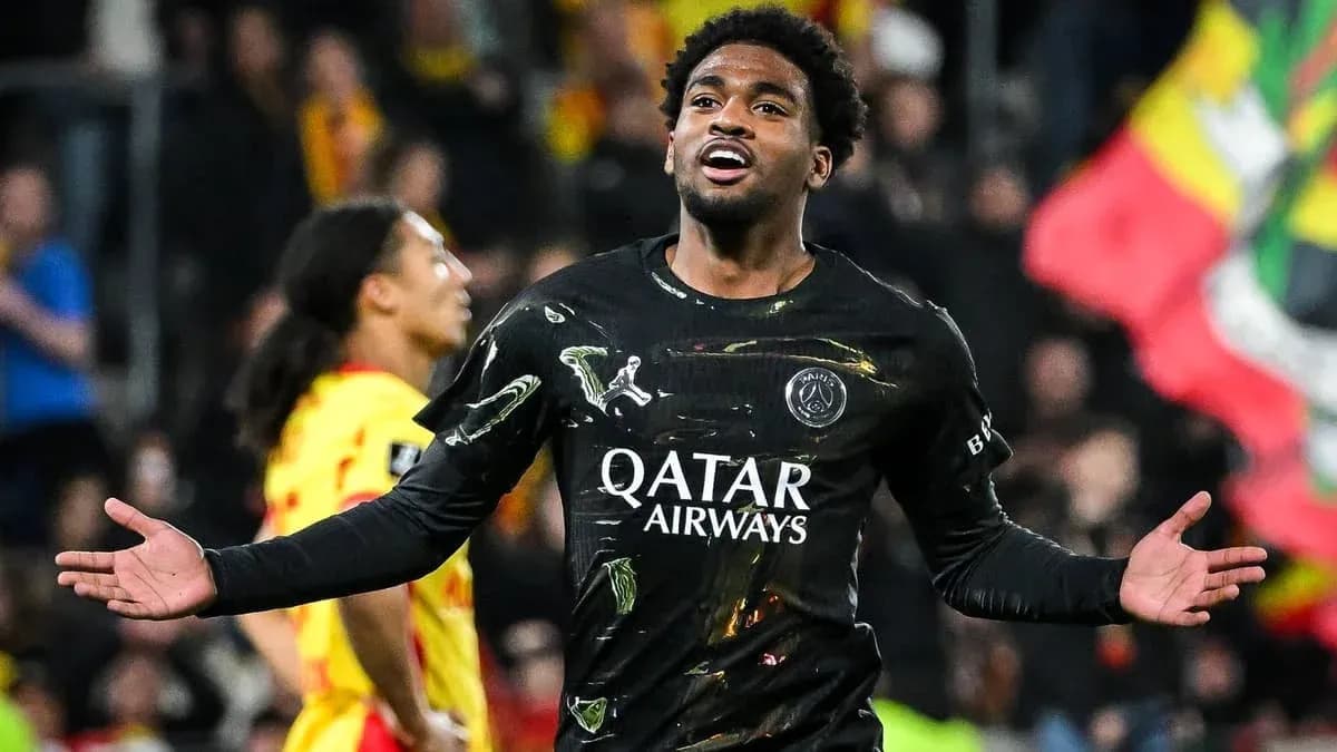 Player celebrating during a match in black jersey Player celebrating during a match in black jersey
