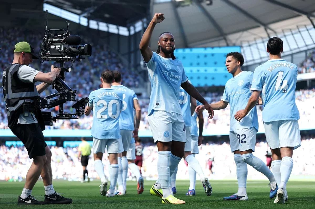 Manchester City players celebrating a goal Manchester City players celebrating a goal