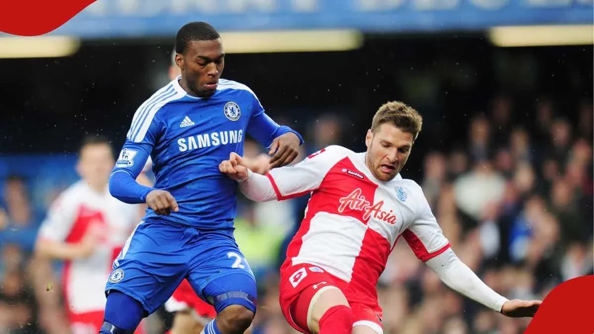 Players challenging for the ball during a match Players challenging for the ball during a match