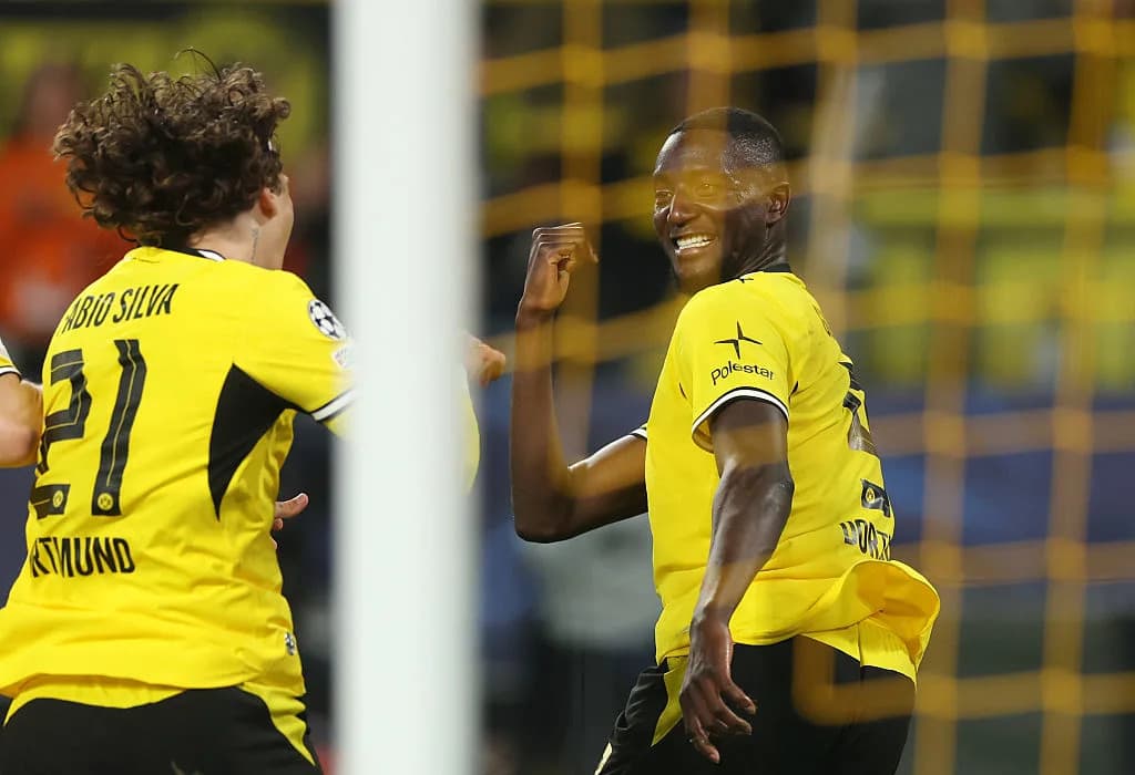 Players celebrating a goal during Champions League match Players celebrating a goal during Champions League match