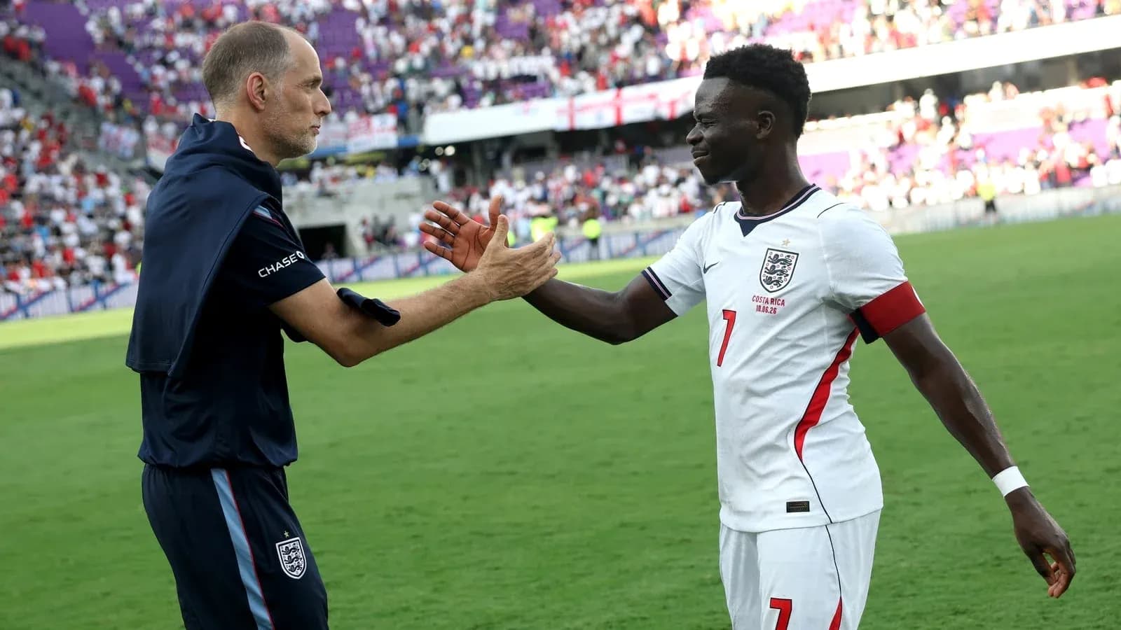 Manager and player shaking hands after match Manager and player shaking hands after match