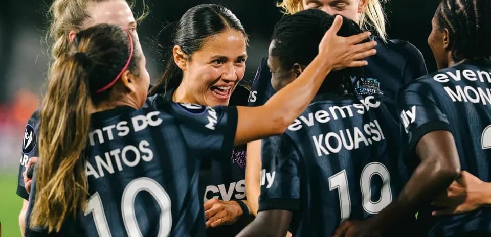 Washington Spirit players celebrating a goal Washington Spirit players celebrating a goal