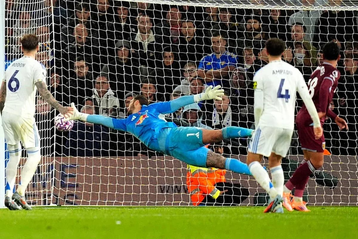 Goalkeeper making a save during match Goalkeeper making a save during match