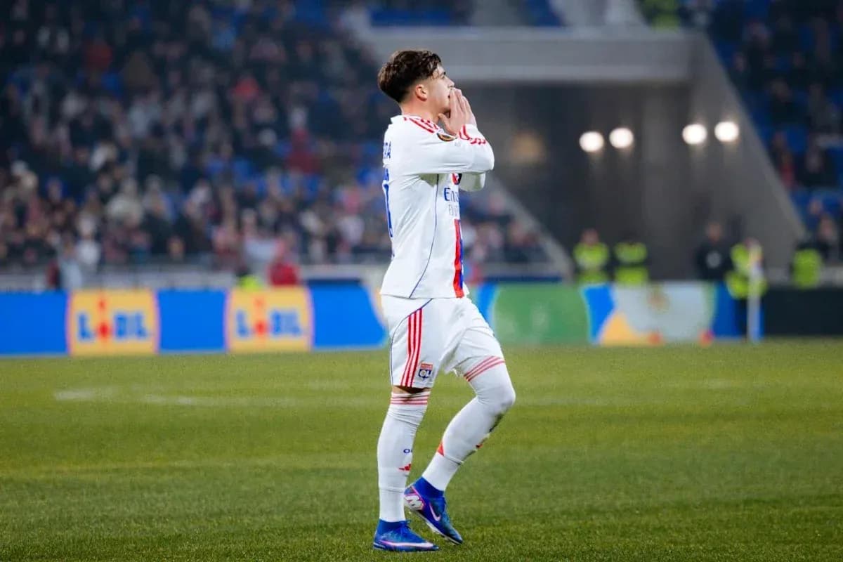Player gesturing during a football match Player gesturing during a football match