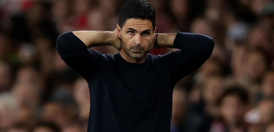 Manager with hands on head during match Manager with hands on head during match