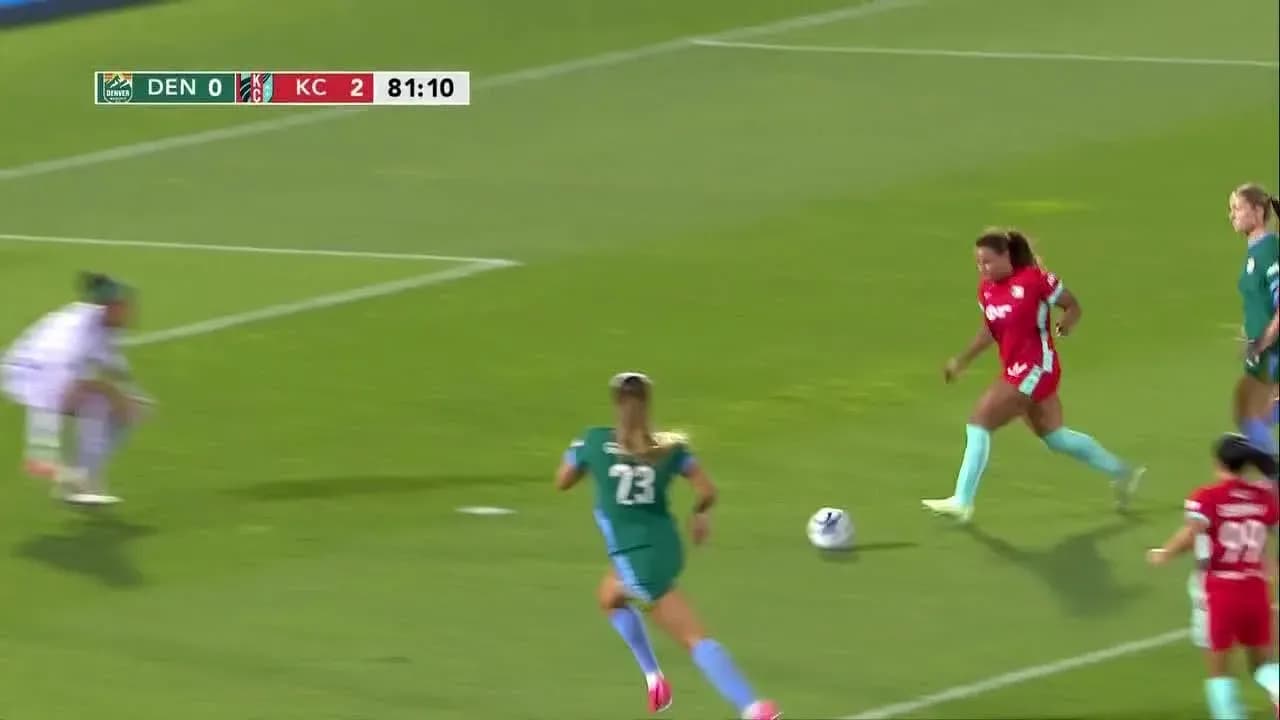 Player dribbling the ball during NWSL match Player dribbling the ball during NWSL match