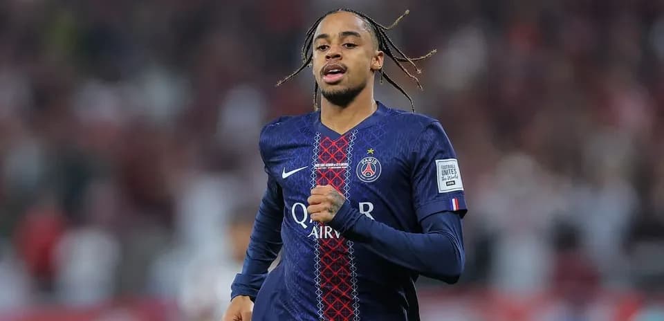 Player running in PSG jersey during match Player running in PSG jersey during match