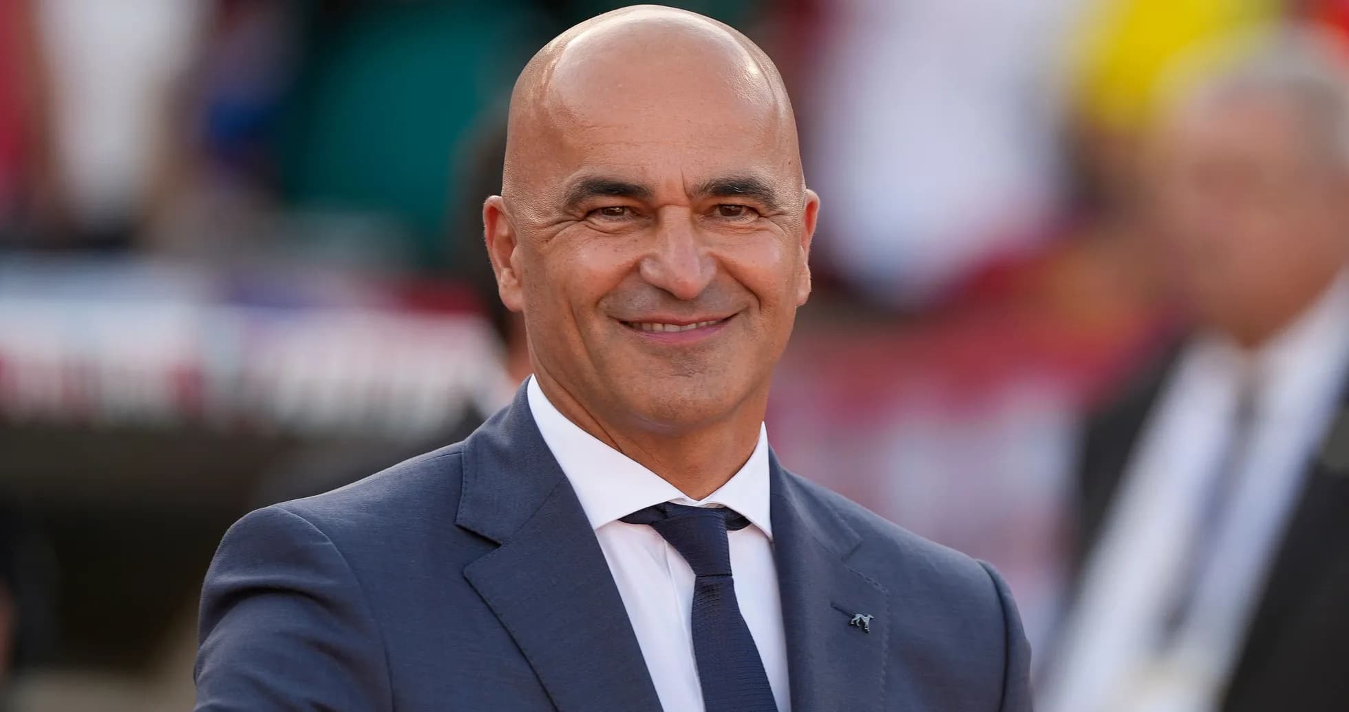 Coach smiling and gesturing during match Coach smiling and gesturing during match
