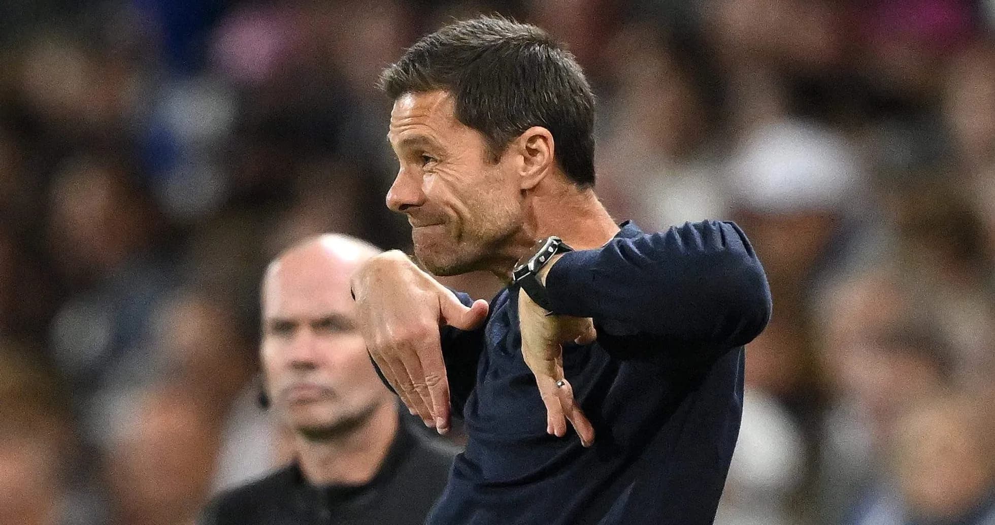 Coach gesturing during a match on the sideline Coach gesturing during a match on the sideline