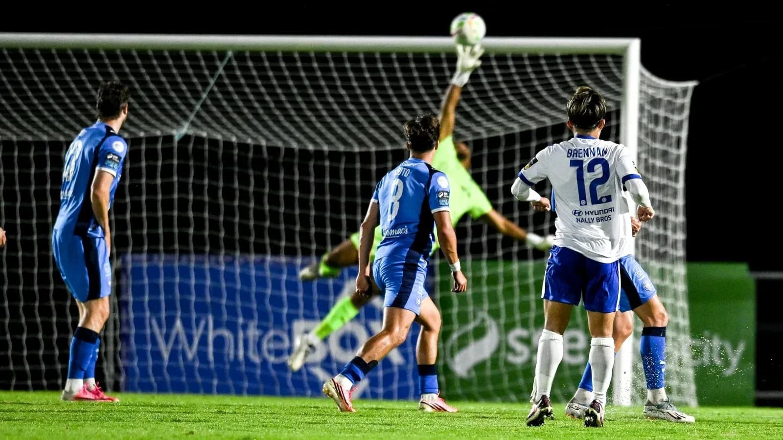 Goalkeeper making a save during football match Goalkeeper making a save during football match
