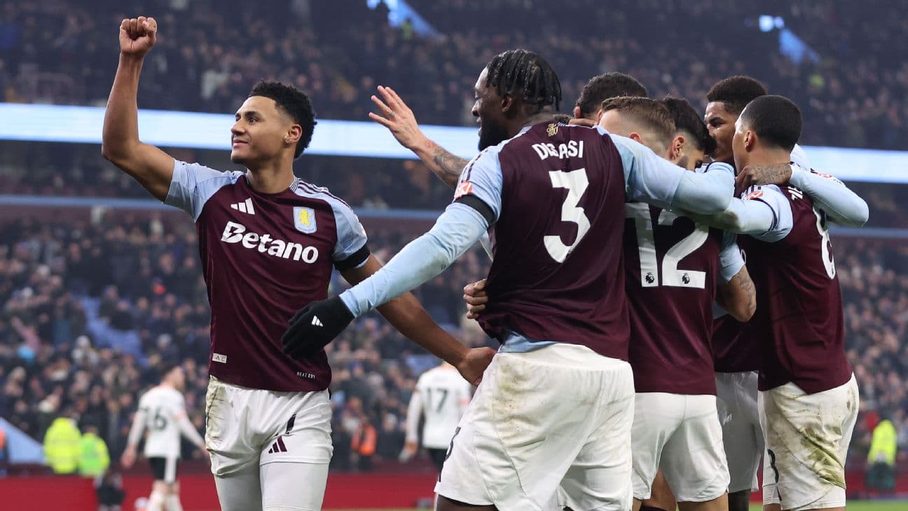 Aston Villa players celebrating a goal Aston Villa players celebrating a goal