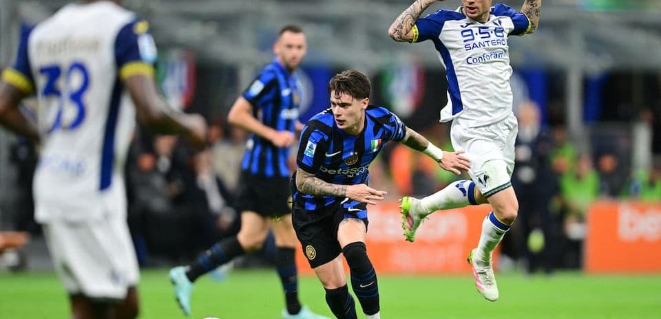 Inter player challenging Hellas Verona opponent Inter player challenging Hellas Verona opponent