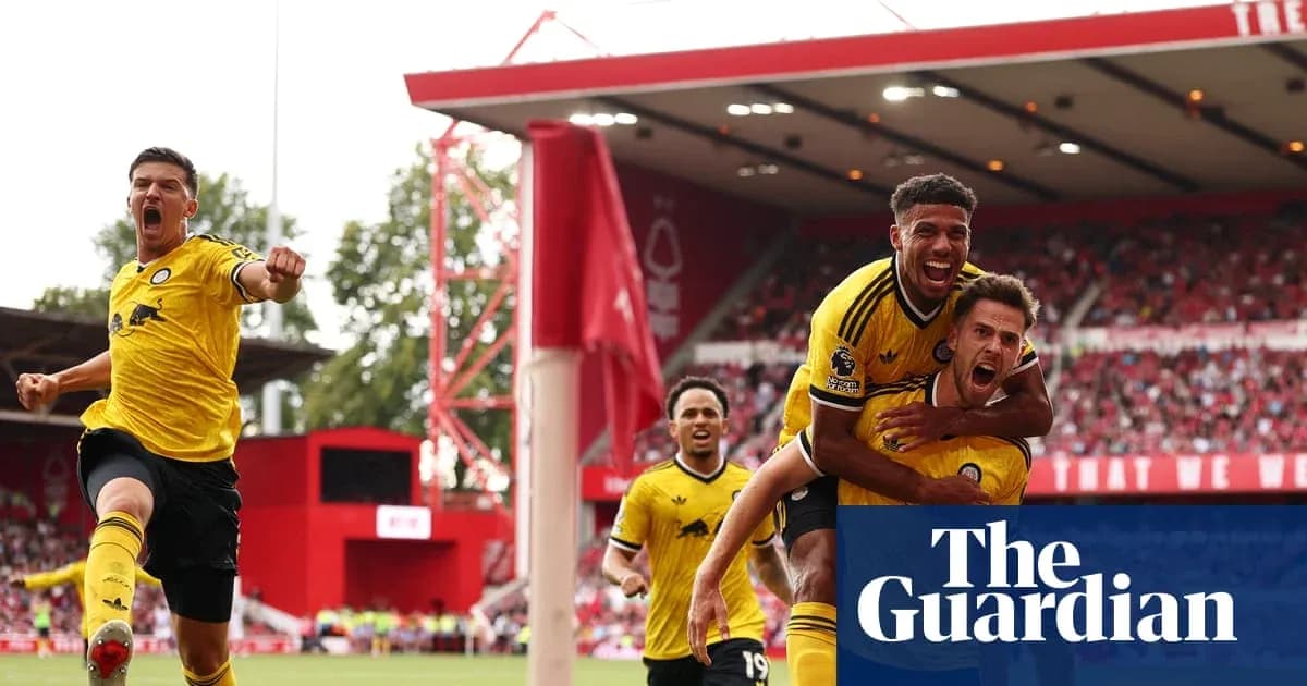 Players celebrating a goal during a match Players celebrating a goal during a match